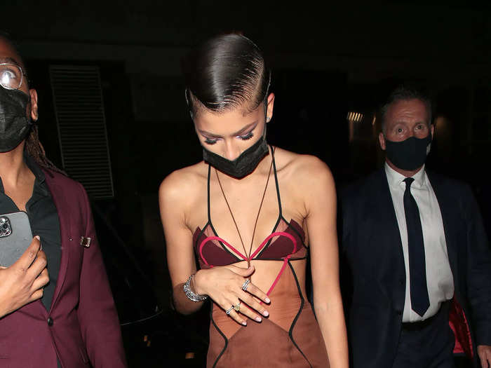 At a "Dune" premiere after-party, Zendaya wore a custom Nensi Dojaka dress with sheer paneling and a thigh-high slit.