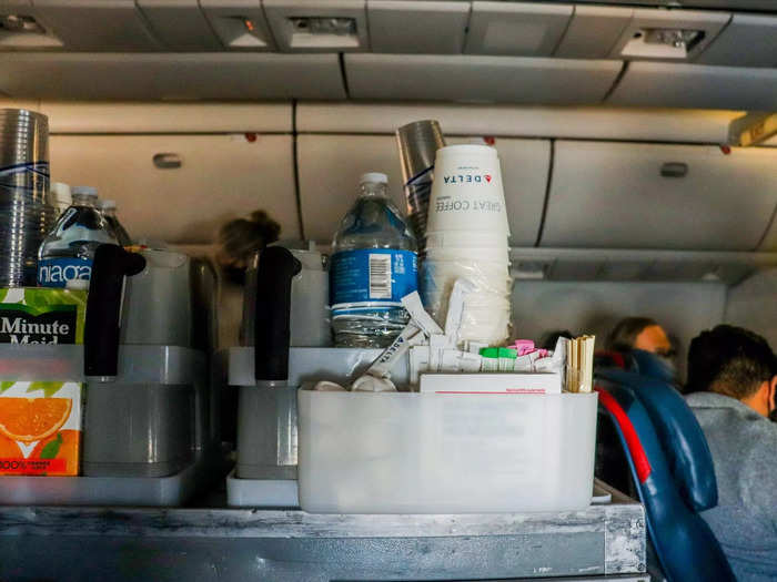 The in-flight service began shortly after takeoff with the beverage offering. Alcohol is complimentary for Comfort+ passengers but I went with soda water as it was much too early to begin drinking.