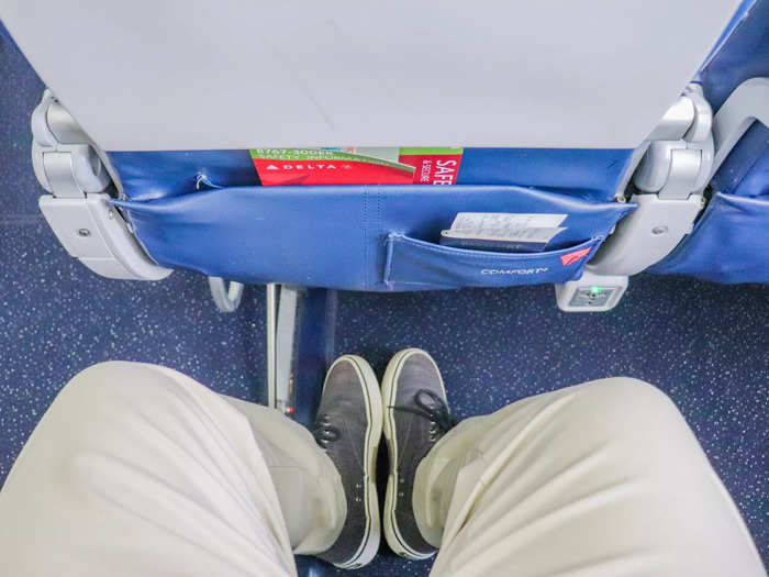 The seat had all the standard economy class amenities but did offer 35 inches of legroom, between two to three inches more than in regular economy.