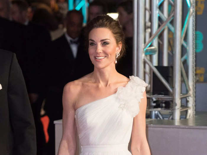 At the 2019 BAFTAs, the duchess looked glamorous in a white one-shoulder Alexander McQueen gown.