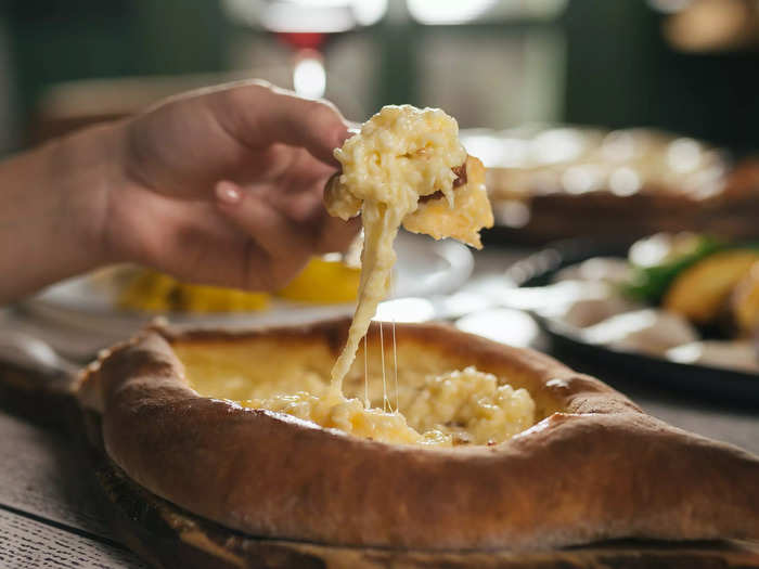 Georgian khachapuri is a toasty bread filled with eggs and cheese.