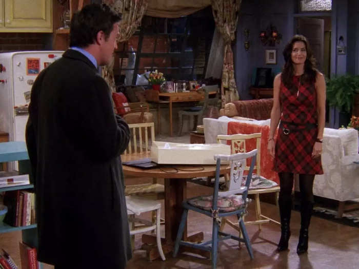 Monica’s dress, tights, and boots are a wonderful combination.