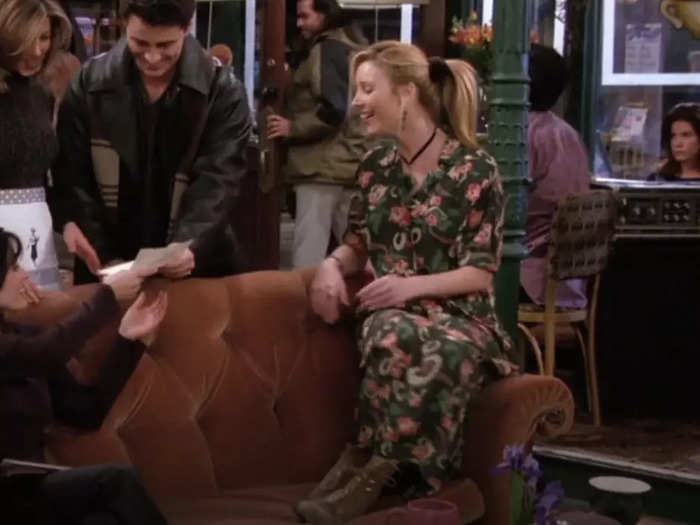 Phoebe’s long dress and scrunchie are perfect for fall.
