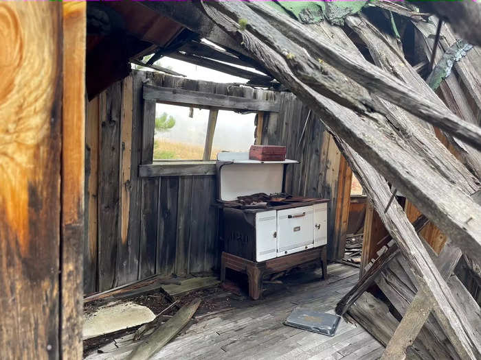 In another room of the house, there was an old porcelain-faced cooking stove.