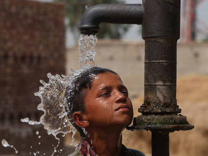 Children often cool off by dousing themselves in water.