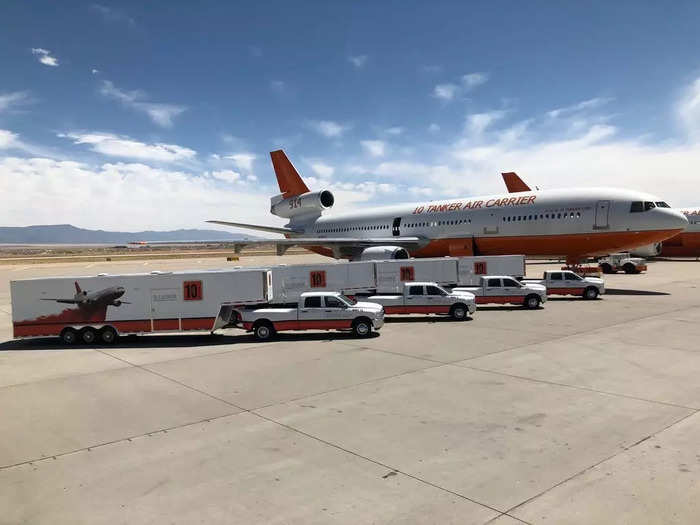 On the ground, 10 Tanker aircraft are followed by seven maintenance technicians equipped with a truck and trailer unit carrying spare parts and equipment, like tires, brakes, or anything else needed for the operation.