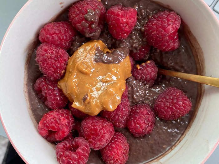 Chocolate protein chia pudding with raspberries and peanut butter