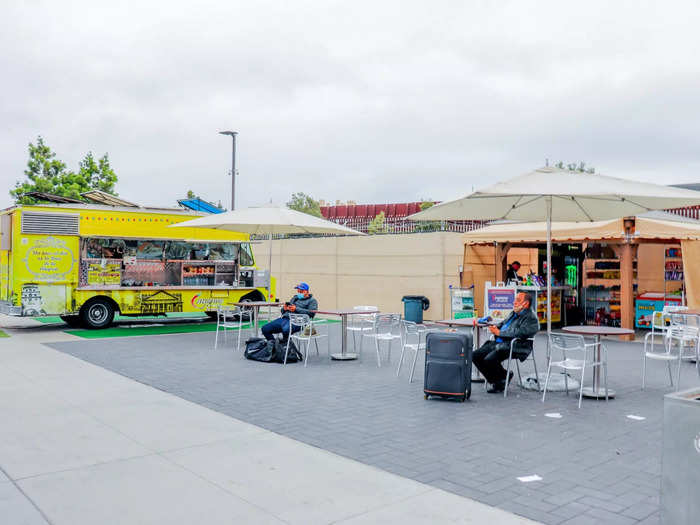 Just outside the terminal doors during my visit was a food truck and a small shop in a tent, as well as an outdoor seating area.