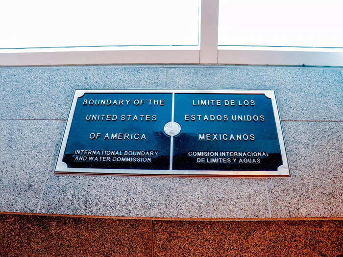 The borderline came around midway down the bridge, with the official placard from the International Boundary and Water Commission demarcating the line.