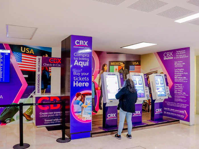 I saw the purple signage for CBX as soon as I entered baggage claim. Three self-serve kiosks are located just beyond the exit doors from the terminal with more spread throughout the baggage claim area.