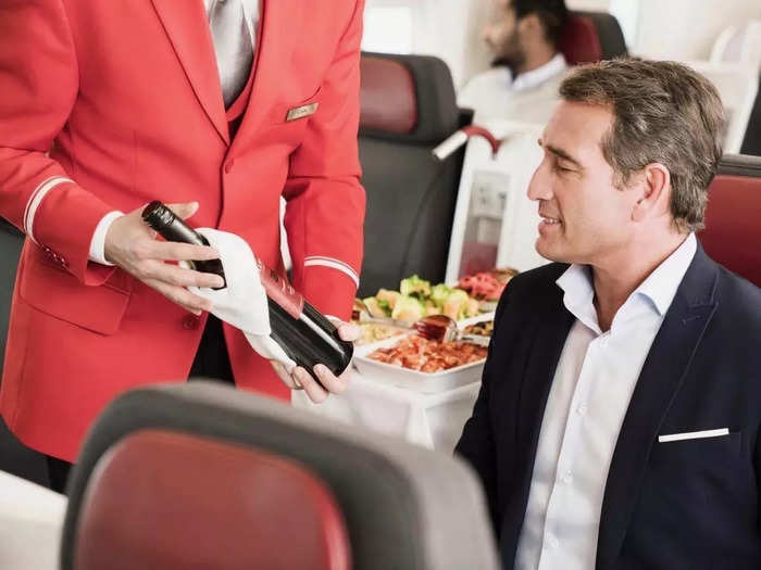 Once the meals are ready, the flight attendants and chefs serve the dishes to the passengers and help with pairing the food with certain drinks, like red or white wine.