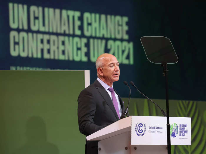 Bezos has been posting photos and videos of his time at COP26, including a photo posted Tuesday of him and his girlfriend, Lauren Sanchez, participating in a panel discussion about conservation.