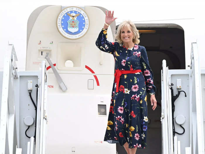 Biden wore a blue floral Oscar de la Renta gown with a red ribbon for a visit to Savannah, Georgia, in July.