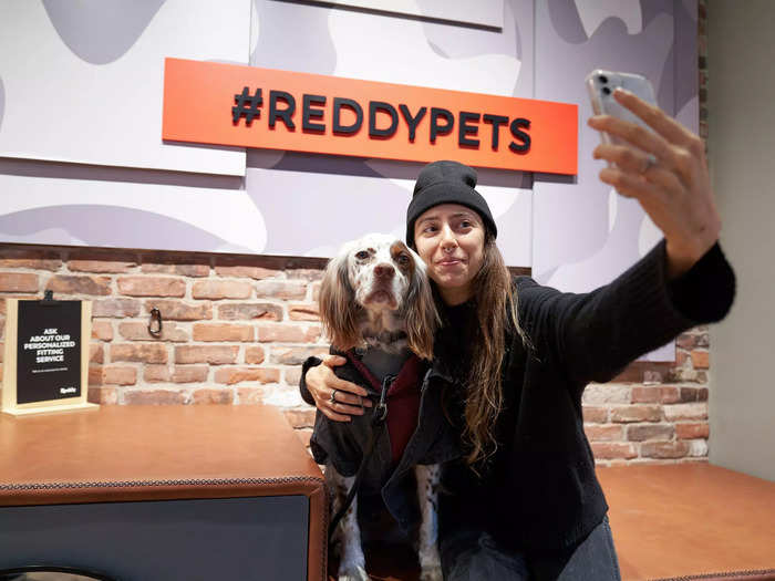 A "Bark Board" highlights community updates, and photos of pet visitors will line the Polaroid wall.