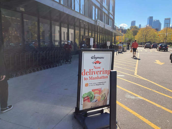 In the parking lot, Wegmans advertised delivery to Manhattan.