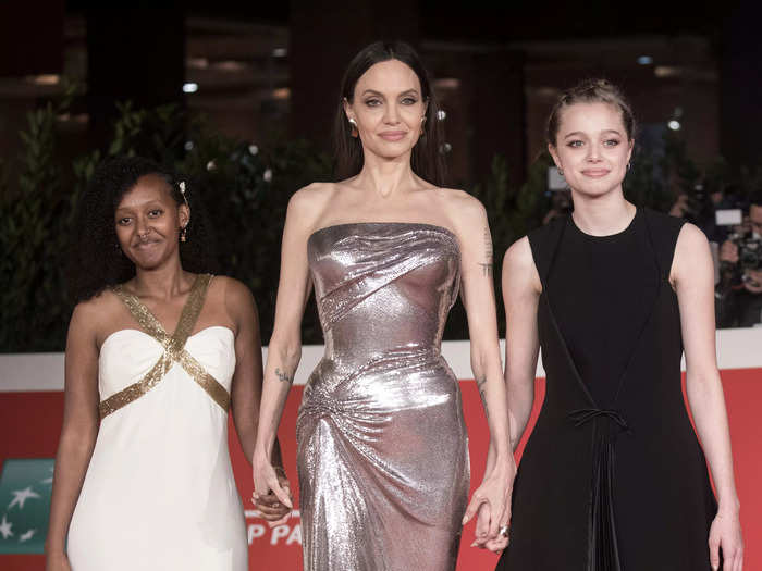 Jolie shined bright in this strapless metallic gown at the "Eternals" premiere in October 2021.