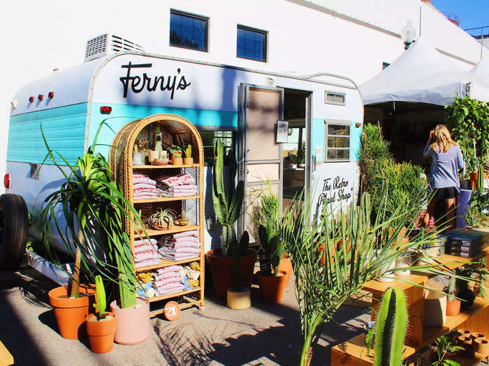 An adorable trailer was converted into a plant store.