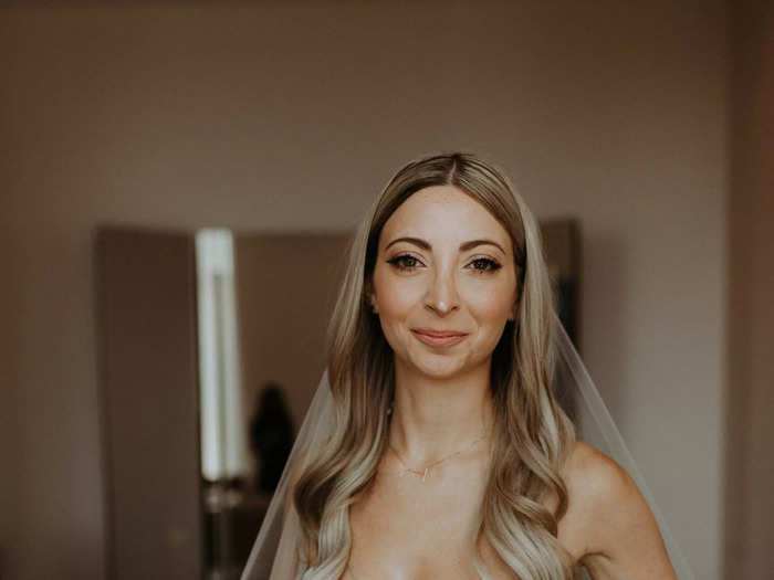 The bride paired the dress with a cathedral veil.