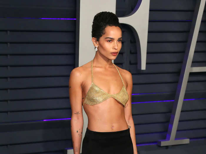 For the 2019 Oscars, Kravitz chose to pair another simple black skirt with a bra, but this time that bra was made of gold.