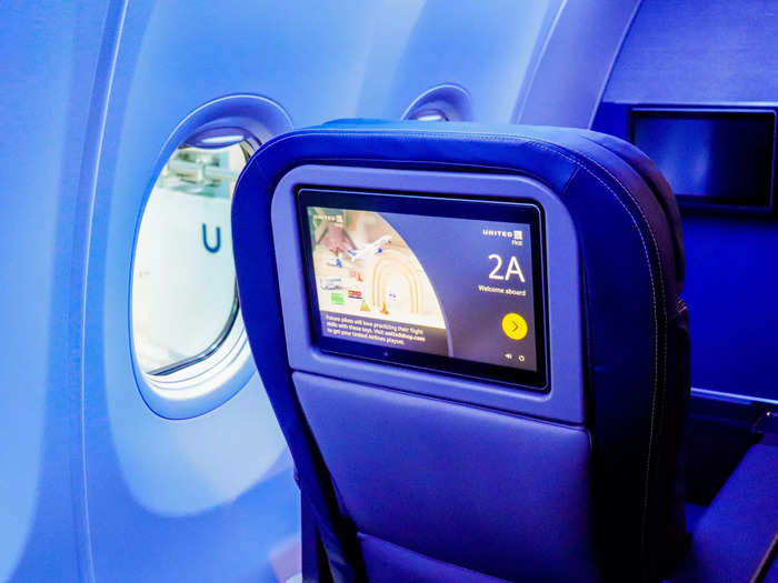 Over the summer, United Airlines announced a new "signature interior" for its Boeing 737 MAX jets, which included adding large inflight entertainment screens, storage units in the central armrests, a TV remote, a bottle holder, and individual USB and power outlets.