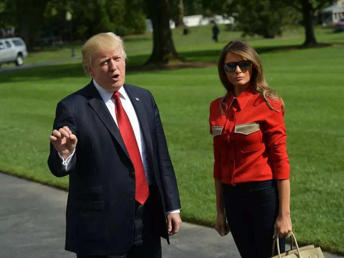 Melania wore a red top to match Trump