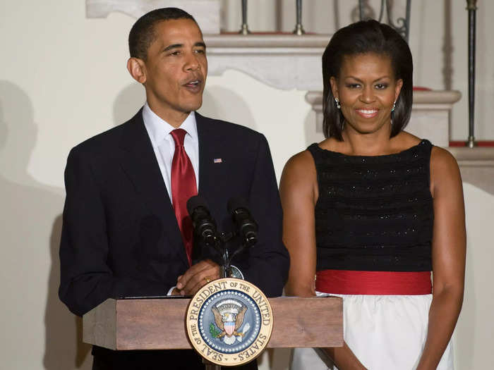 In July 2009, President Barack and first lady Michelle Obama each wore black, white, and red.