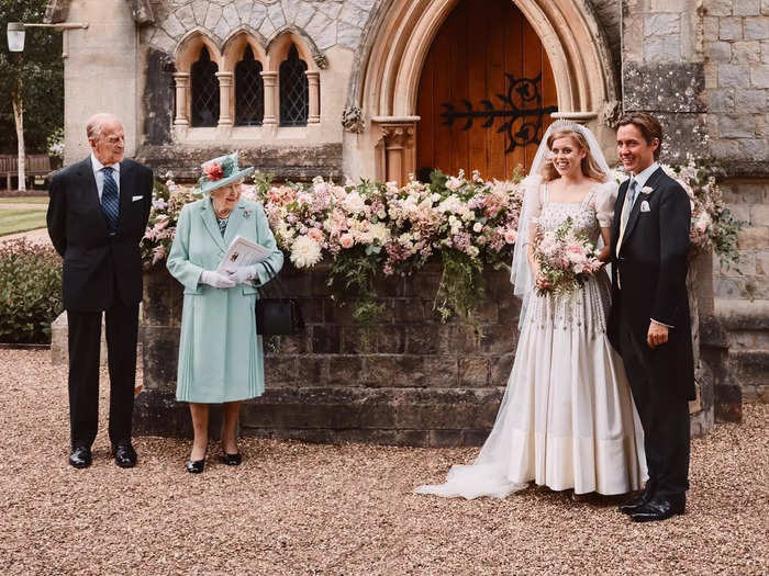 Instead of a custom-made wedding dress, Beatrice wore a Norman Hartnell gown that once belonged to Queen Elizabeth.