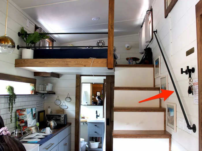 The handrail for the loft staircase took up minimal space in the tiny house.