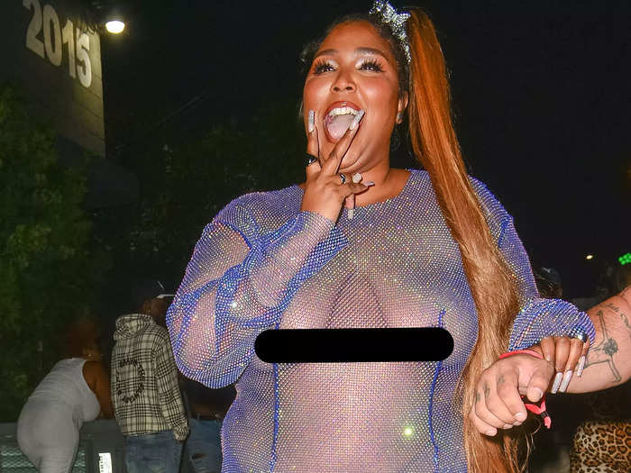 Lizzo wore a completely see-through dress that was covered in sparkles for Cardi B