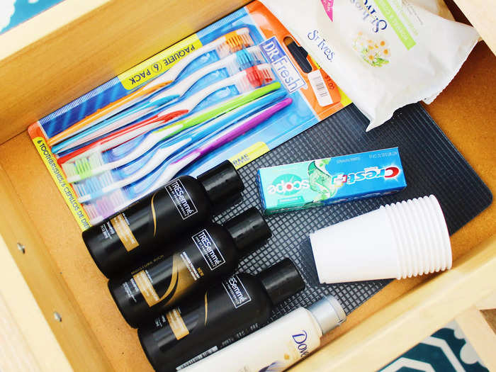 There was also a drawer filled with extra toiletries like toothbrushes, toothpaste, shampoo, and conditioner.