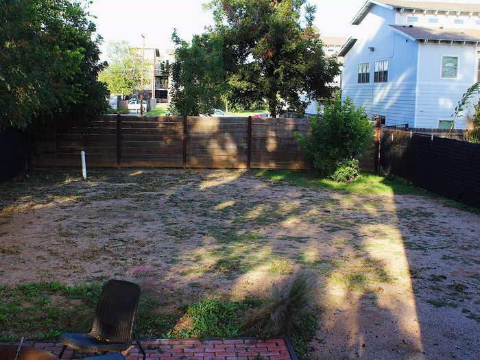 The backyard is on the smaller side, but you can actually see the Silos from it.