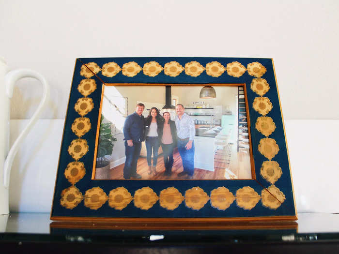 One of the first things I noticed was this framed photo of the owners, Cameron and Jessie, posing in their new home with Chip and Joanna Gaines.