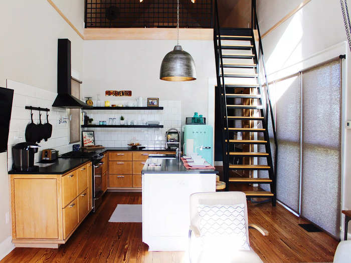 Just beyond the living room area was the eat-in kitchen, which has barstools for seating.