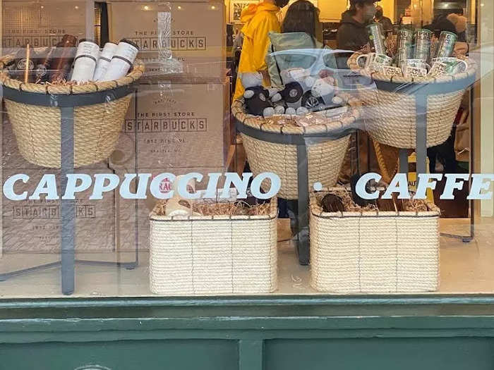 I was immediately struck by the lettering on the windows announcing that the store sells cappuccinos, lattes, and espressos. I don