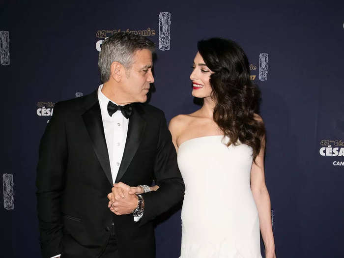 In 2017, the Clooneys looked smitten while wearing black-and-white looks at a French awards ceremony.