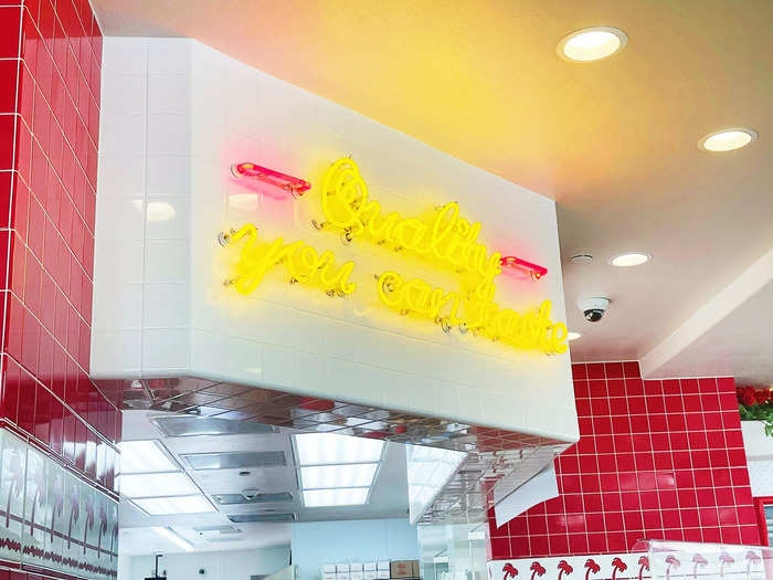 A cheery neon sign proclaimed In-N-Out