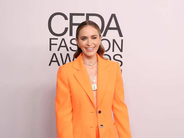 Emily Blunt also went shirtless and made a statement in a bright-orange suit.