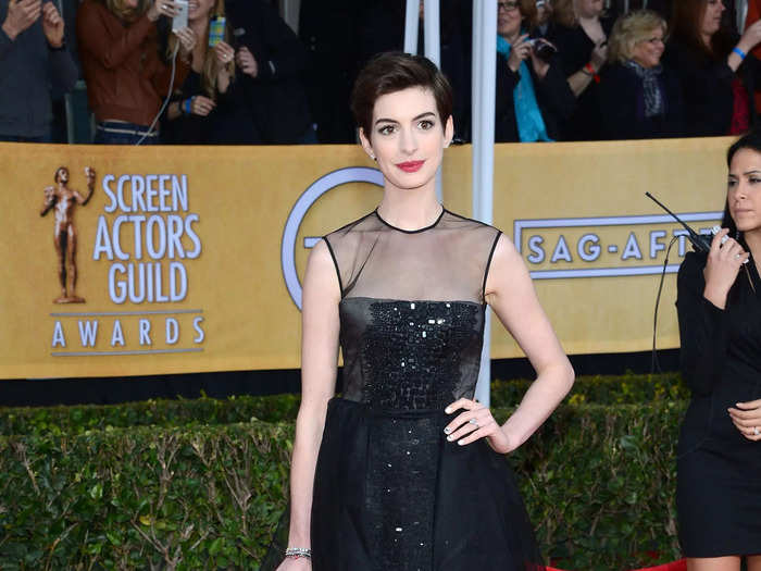 Hathaway wore this tea-length sequined gown fit for a princess at the SAG Awards in January 2013.