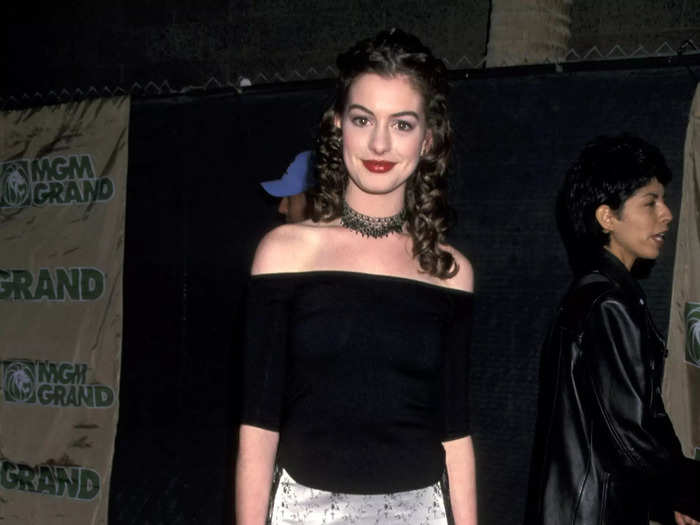 At one of her first red carpet appearances, the 1999 Billboard Music Awards, Anne Hathaway wore a patterned white silk skirt with an exaggerated fringe hem.