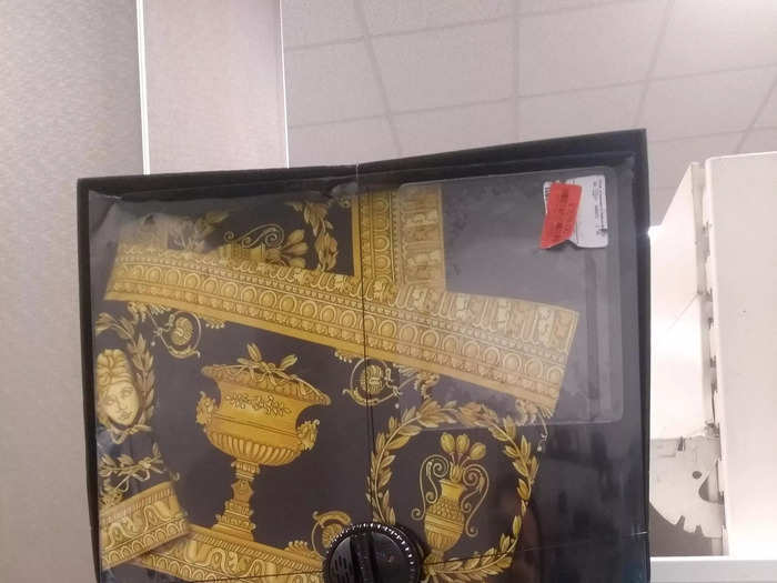 ... and this $550 item in a box sealed with a security tag. The back of the box was blank, and we had no clue what the item was or why it cost so much.