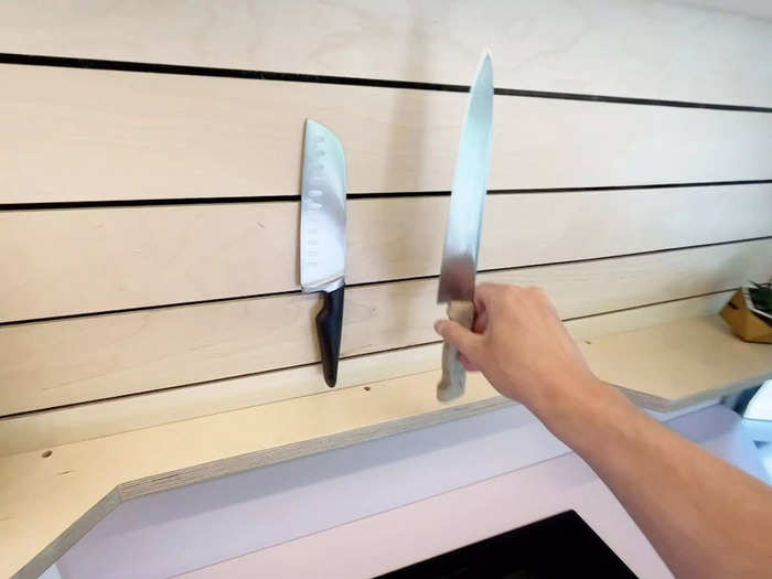 A magnetic wall in the kitchen means you can neatly store your knives.