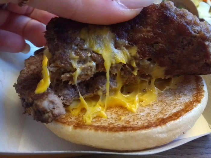 ... while the cheese slices in the Quarter Pounder, which were both underneath and on top of the patty, had completely melted.