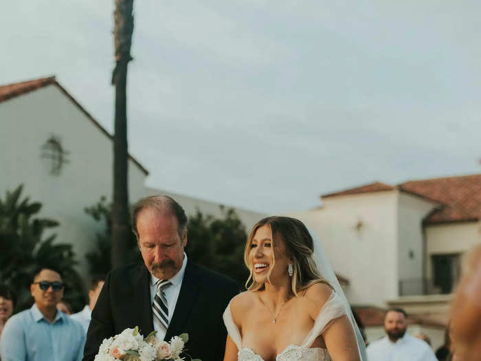 Hill fell in love with a custom Galia Lahav gown with a mermaid skirt.