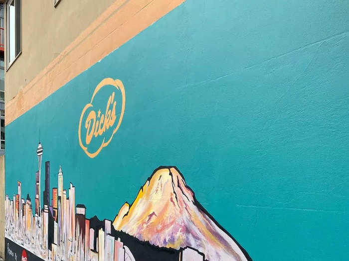 I ended up ordering a deluxe burger, fries, and a strawberry shake. As I was leaving with my food, I noticed a nice mural of the Seattle skyline on the side of the building.