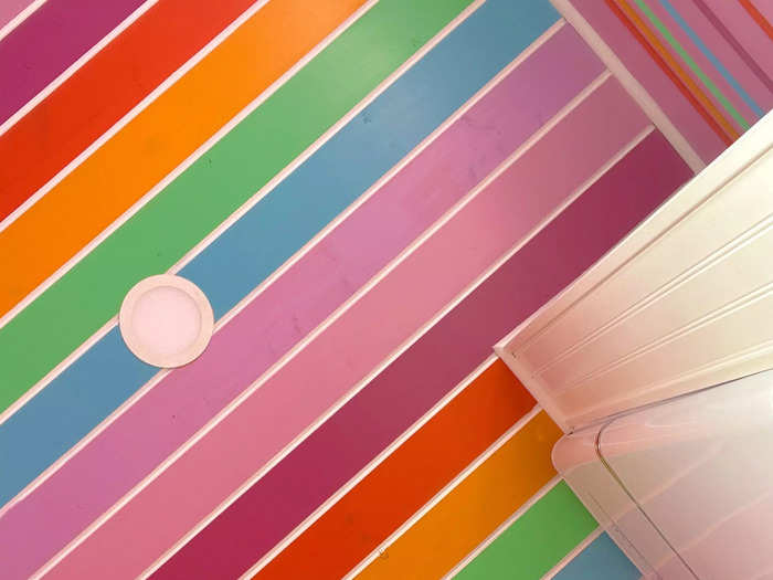 And the ceiling is covered in a rainbow of stripes.