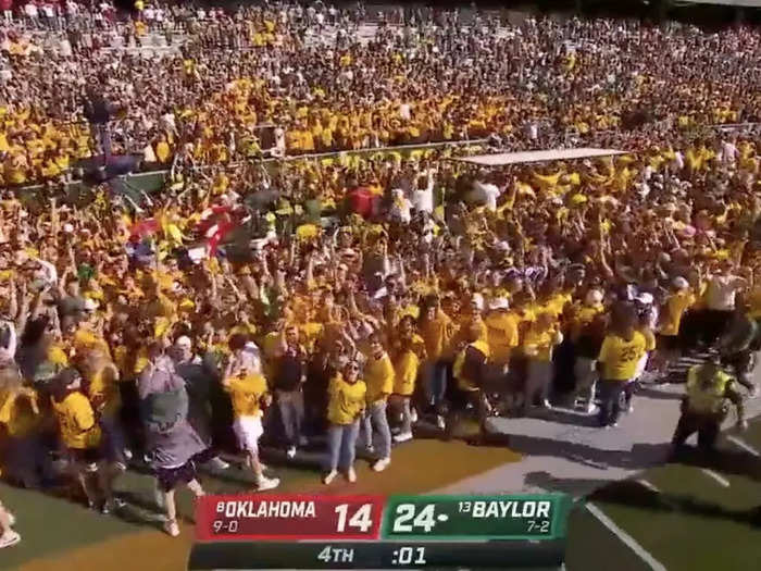 While the field was eventually cleared, the sidelines were packed.