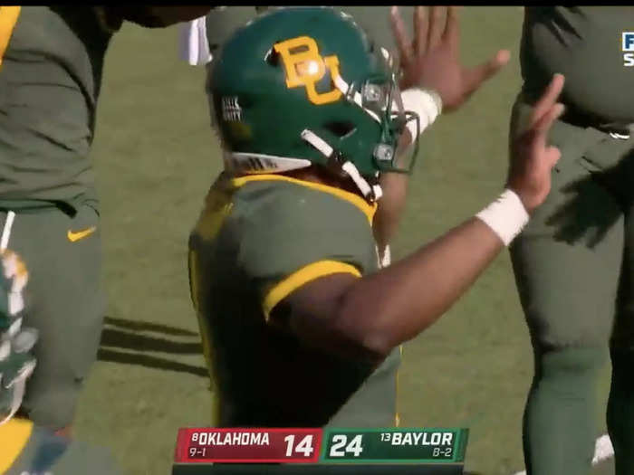 Baylor quarterback Gerry Bohanon tried to tell fans that there was still a second left on the clock to no avail.