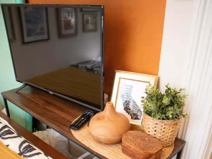 I added a narrow console table at the end of my bed.