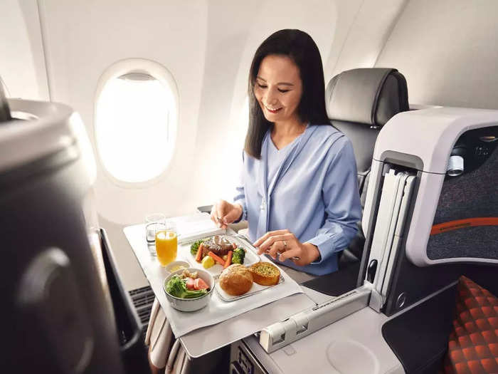 A wide tray table for eating and working…