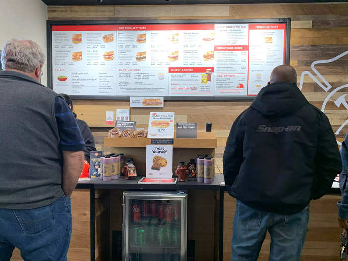 The menu posted above the register displays around a dozen specialty subs, or you can make your own combination of the ingredients.